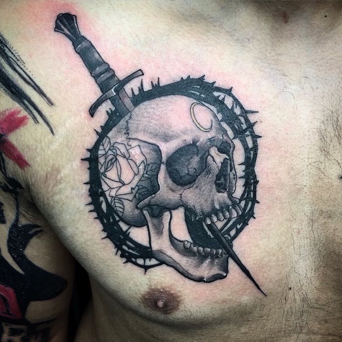 A Skull Dagger and Thorns Tattoo