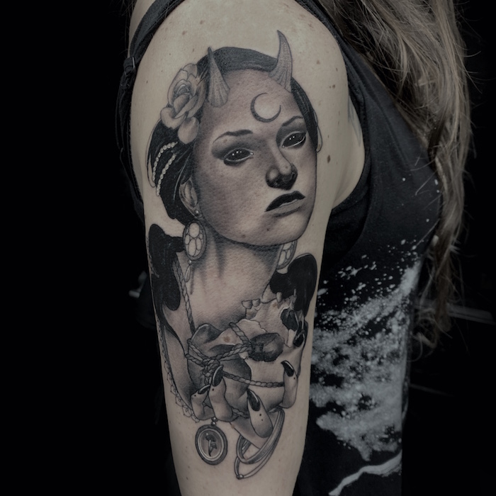 A Crow and Roses Tattoo