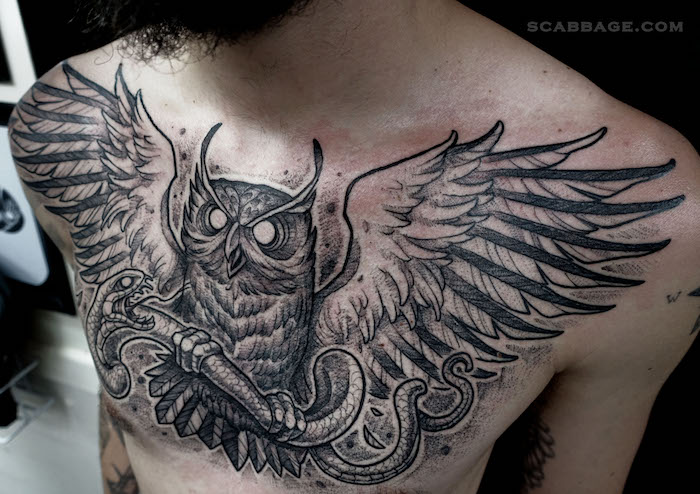 owl on chest tattoo