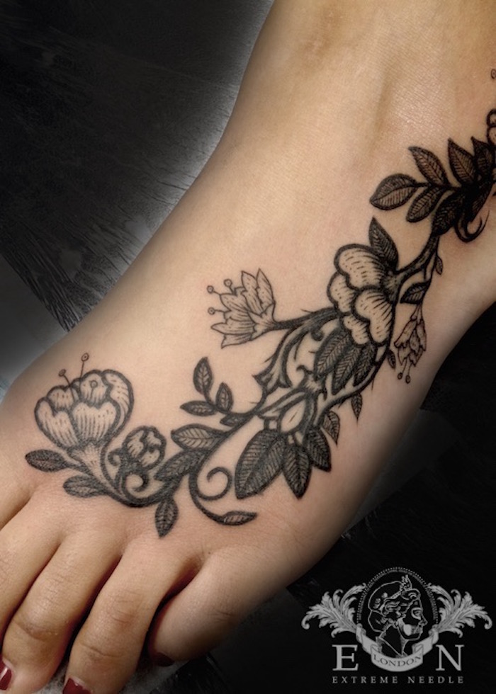 Flowers on feet dotwork tattoo