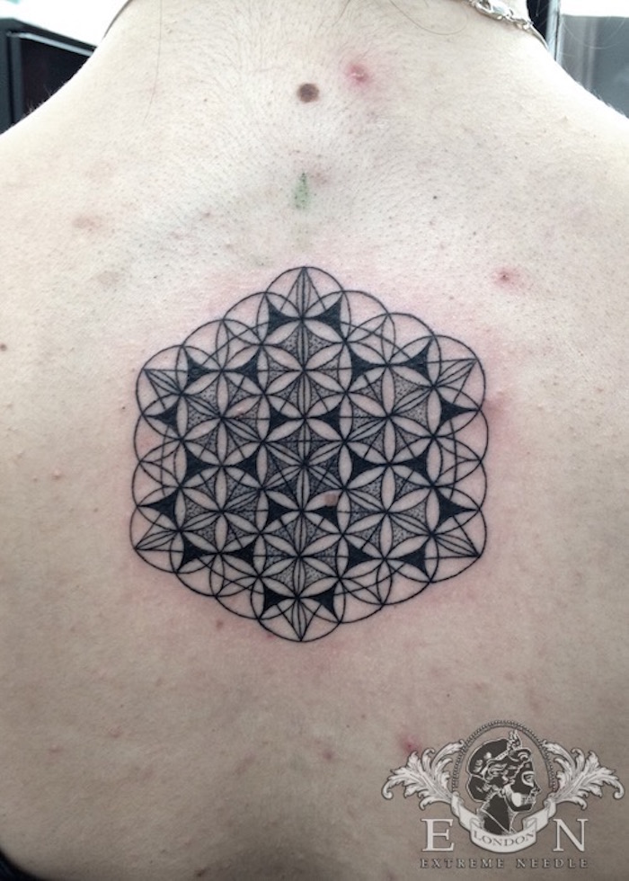Geometric dotwork tattoo